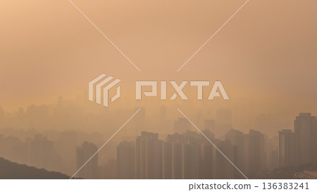 Jan 24 2026 Hazy Sunset Over Kowloon Urban Skyline Hong Kong Jan 24 2026 Hazy Sunset Over Kowloon Urban Skyline Hong Kong 136383241