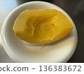 Close-up of boiled string pumpkin in a white bowl 136383672