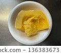 How to separate boiled thread pumpkin in a white dish 136383673
