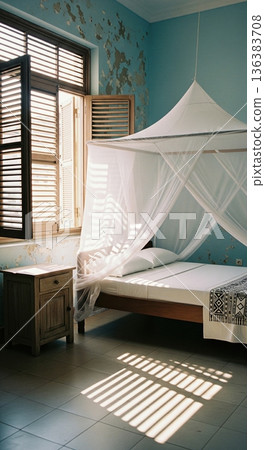 Vintage bedroom interior with peeling blue walls and canopy bed near open shutter window 136383708
