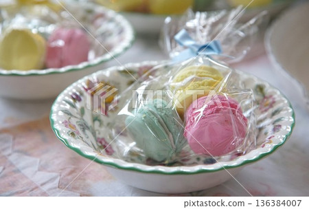 Colorful macarons wrapped in a transparent film Colorful macarons wrapped in a transparent film 136384007