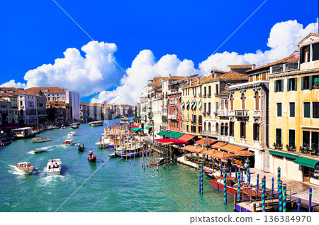 Beautiful canals of Venice and cumulonimbus clouds Beautiful canals of Venice and cumulonimbus clouds 136384970