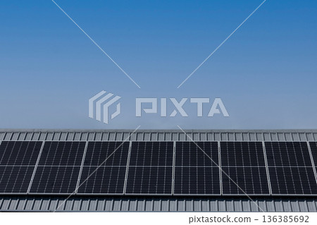 Solar power panels on the roof for green energy. Solar power panels on the roof for green energy. 136385692