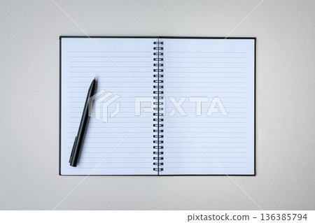 Open notepad with one pen. Open notepad with one pen. 136385794