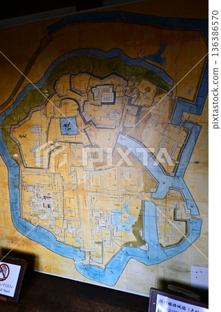 Old maps and antique drawings of castles that tell the story of their history 136386570
