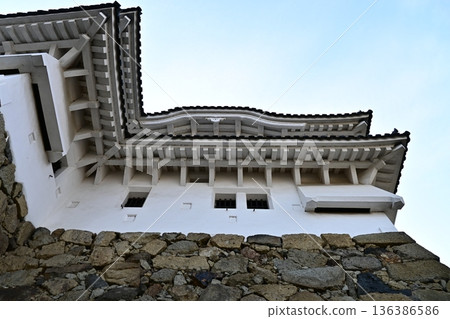 Traditional Japanese Beauty: Sturdy Castle Stone Walls and White Plaster Keep Traditional Japanese Beauty: Sturdy Castle Stone Walls and White Plaster Keep 136386586