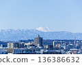 Mount Fuji and the cityscape as seen from Fudobashi Bridge in Seijo 136386632
