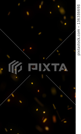 Floating golden sparks and ember particles on dark background, cinematic bokeh fire overlay Floating golden sparks and ember particles on dark background, cinematic bokeh fire overlay 136386698
