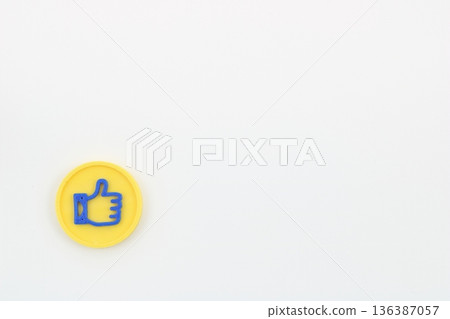 A blue thumbs up icon for a good job A blue thumbs up icon for a good job 136387057