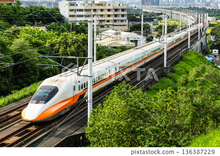 Overlooking view of the Taiwan High Speed Rail trains passing Changhua in Taiwan. It is the only high-speed railway in Taiwan. 136387229