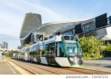 The circular light rail train drives past the Kaohsiung Port Cruise Terminal station in Taiwan. 136387232