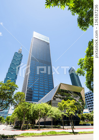 Building view of the Nan Shan Plaza and Taipei 101 in Xinyi of Taipei, Taiwan. Building view of the Nan Shan Plaza and Taipei 101 in Xinyi of Taipei, Taiwan. 136387236