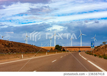 Windmills for electric power production on the road in Spain. Windmills for electric power production on the road in Spain. 136387418