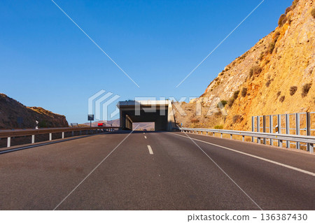 Highway in the mountains of the La Perdiz, Spain Highway in the mountains of the La Perdiz, Spain 136387430