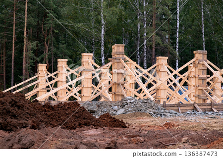 construction of a new house in the forest 136387473