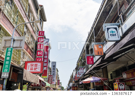 Low-angle view of the Guohua Old Street and Yong-Le Public Retail Market in Tainan, Taiwan. There are many well-known traditional food stalls here. 136387617