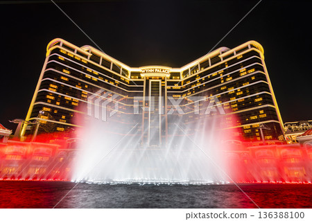 Beautiful night view of Wynn Palace Performance Lake displays a water, music, and light show, is a hotel casino resort on the Cotai Strip in Macau, China. 136388100