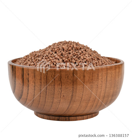Buckwheat porridge in a brown wooden bowl, on a white background 136388157
