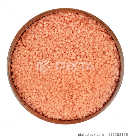 Lentil cereal in a brown wooden bowl isolate on a white background Lentil cereal in a brown wooden bowl isolate on a white background 136388158