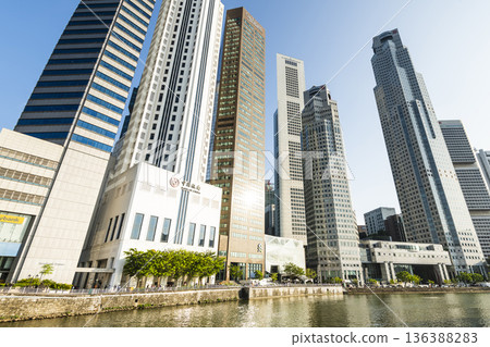 Panoramic view of the Financial District skyscrapers along the Singapore River.  136388283