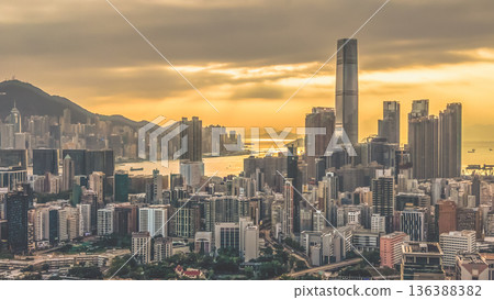 Feb 1 2026 Warm Sunset Illuminates Yau Tsim Mong Skyline And Harbour 136388382