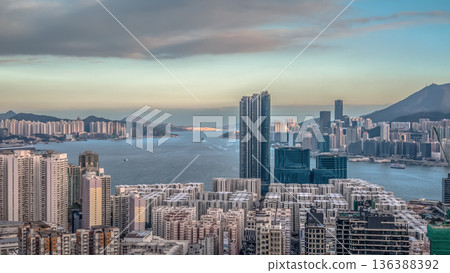 Feb 1 2026 Warm Evening Light Illuminates Hung Hom Skyline Beside Harbour Feb 1 2026 Warm Evening Light Illuminates Hung Hom Skyline Beside Harbour 136388392