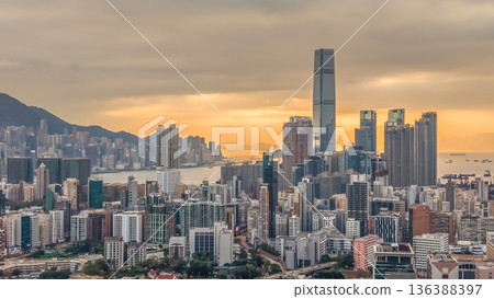 Feb 1 2026 Warm Sunset Illuminates Yau Tsim Mong Skyline And Harbour 136388397