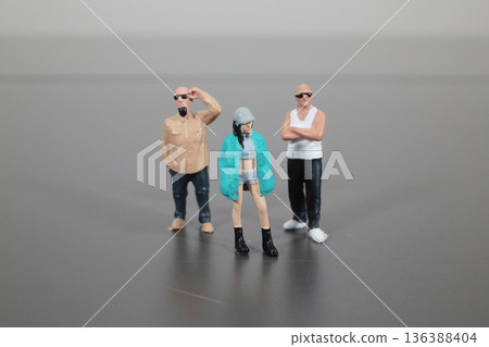 Miniature Figures Pose Together Creating Stylish Character Scene Miniature Figures Pose Together Creating Stylish Character Scene 136388404