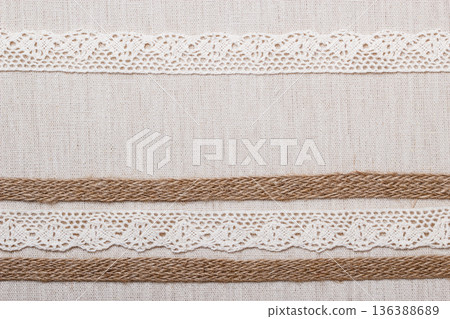 Lace frame on linen cloth background Lace frame on linen cloth background 136388689