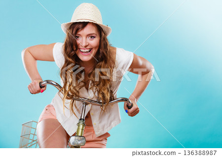 Active woman riding bike bicycle. Recreation. Active woman riding bike bicycle. Recreation. 136388987