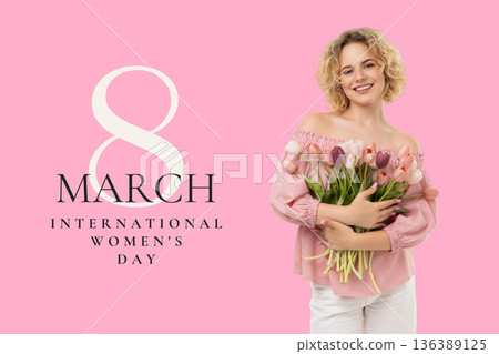 A woman smiles while holding flowers to celebrate Women's Day A woman smiles while holding flowers to celebrate Women's Day 136389125