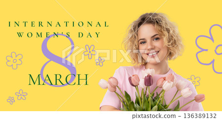 A woman holds flowers and smiles for International Women's Day 136389132