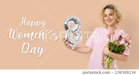 Girl holds flowers and balloons while celebrating Women's Day Girl holds flowers and balloons while celebrating Women's Day 136389134