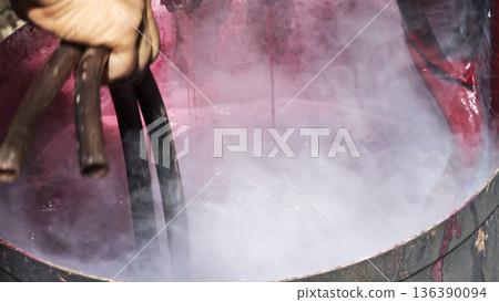 The pink dye derived from lac is used as a natural dye for fabrics using traditional methods. The pink dye derived from lac is used as a natural dye for fabrics using traditional methods. 136390094