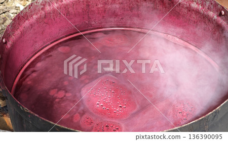 The pink dye derived from lac is used as a natural dye for fabrics using traditional methods. The pink dye derived from lac is used as a natural dye for fabrics using traditional methods. 136390095