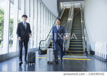 Walking businessman Walking businessman 136390342