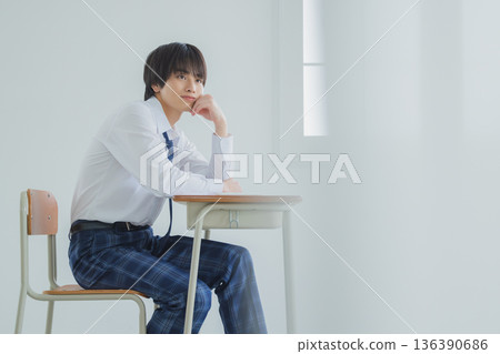 Male high school student studying Male high school student studying 136390686