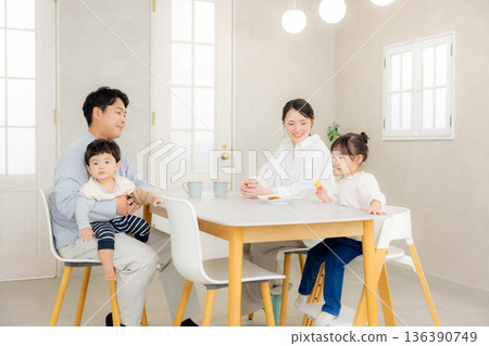 Young family, parents and children, living room Young family, parents and children, living room 136390749