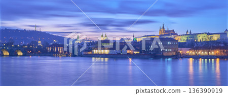 Panoramic evening view of Prague castle and Vltava river in Czech republic Panoramic evening view of Prague castle and Vltava river in Czech republic 136390919