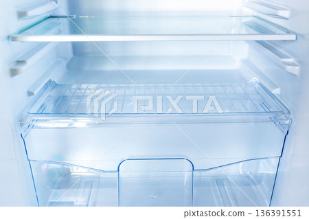 new modern refrigerator opens to reveal the inside, empty refrigerator new modern refrigerator opens to reveal the inside, empty refrigerator 136391551