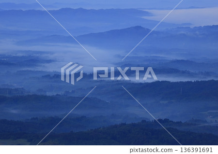 Mountains floating in the sea of clouds Mountains floating in the sea of clouds 136391691
