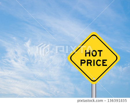 Yellow transportation sign with word hot price on blue color sky background Yellow transportation sign with word hot price on blue color sky background 136391835