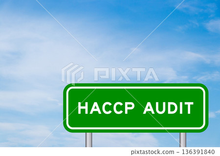 Green color transportation sign with word HACCP (Hazard Analysis Critical Control Points) audit on blue sky with white cloud background Green color transportation sign with word HACCP (Hazard Analysis Critical Control Points) audit on blue sky with white cloud background 136391840