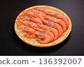 Red shrimp served in a colander 136392007