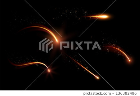 A set of abstract glowing falling golden lights with bright flashes and shimmering particles. 136392496