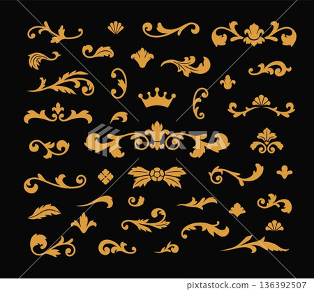Curved golden arabesques in vintage Baroque style on a black isolated background. Curved golden arabesques in vintage Baroque style on a black isolated background. 136392507