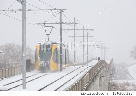 Utsunomiya Light Rail and heavy white snow Utsunomiya Light Rail and heavy white snow 136393183