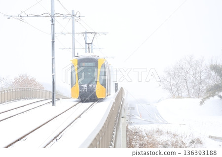 Utsunomiya Light Rail and heavy white snow 136393188