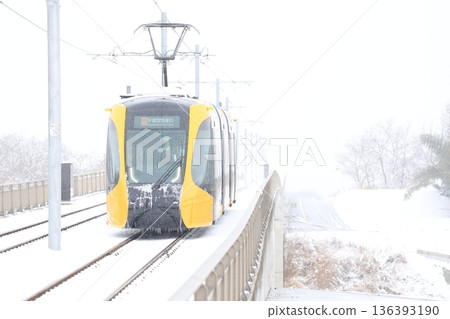 Utsunomiya Light Rail and heavy white snow Utsunomiya Light Rail and heavy white snow 136393190