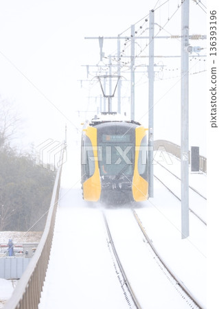 Utsunomiya Light Rail and heavy white snow Utsunomiya Light Rail and heavy white snow 136393196